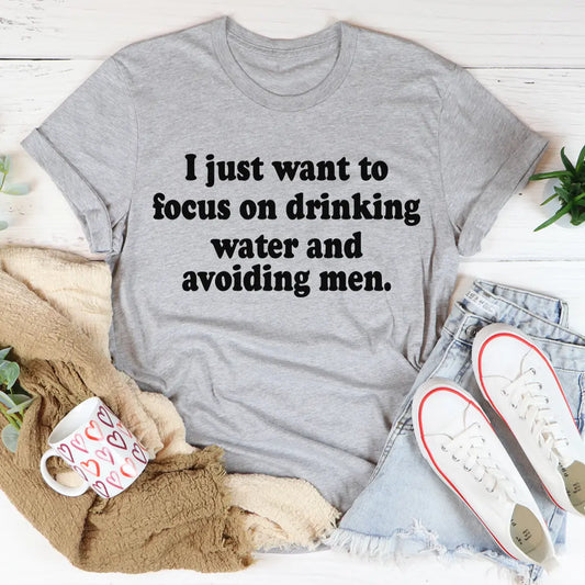 I Just Want to Focus On Drinking Water And Avoiding Men T-Shirt MerchMallow